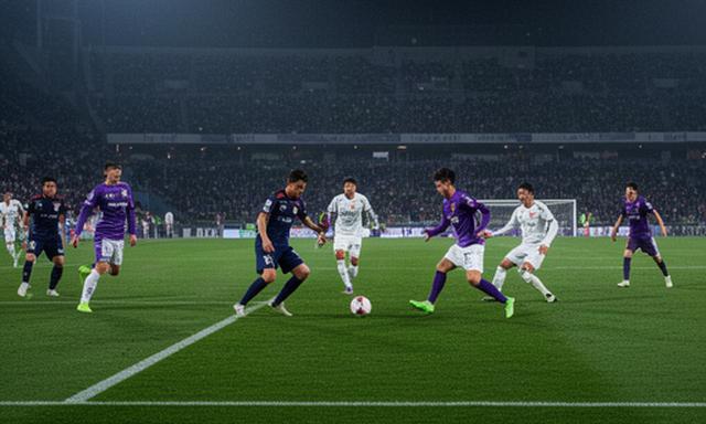 ナイターのサッカー競技場で関西クラブの選手たちがビルドアップを進める場面